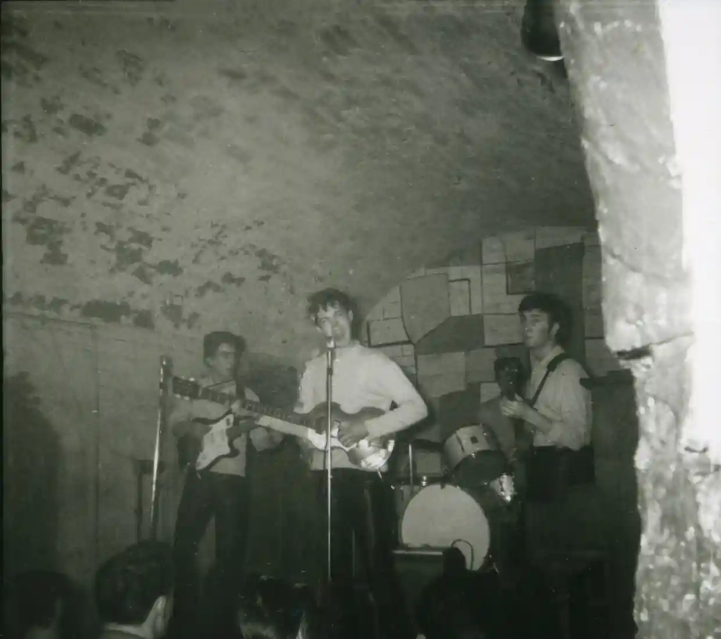 Rare photos emerge showing the Beatles performing at the Cavern Club in 1961.