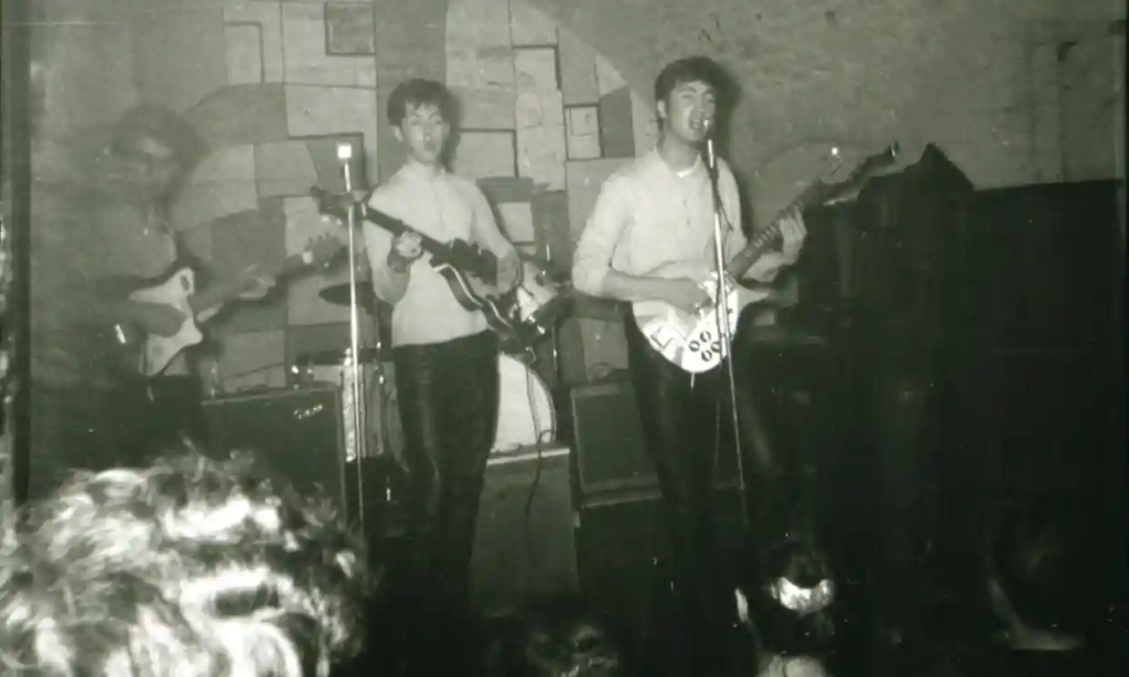 Rare photos emerge showing the Beatles performing at the Cavern Club in 1961.